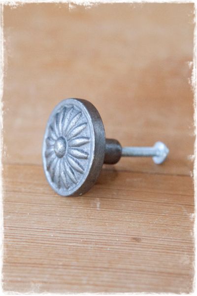 grijze ronde deurknop bloem
